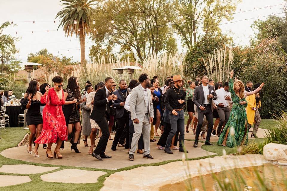 Guests Sat at Colorful Caterpillar-Style Reception Tables at This Wedding in the Arizona Desert